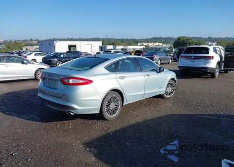 2013 Ford Fusion Hybrid Se z USA, uszkodzony, nr VIN 3FA6P0LUXDR187683